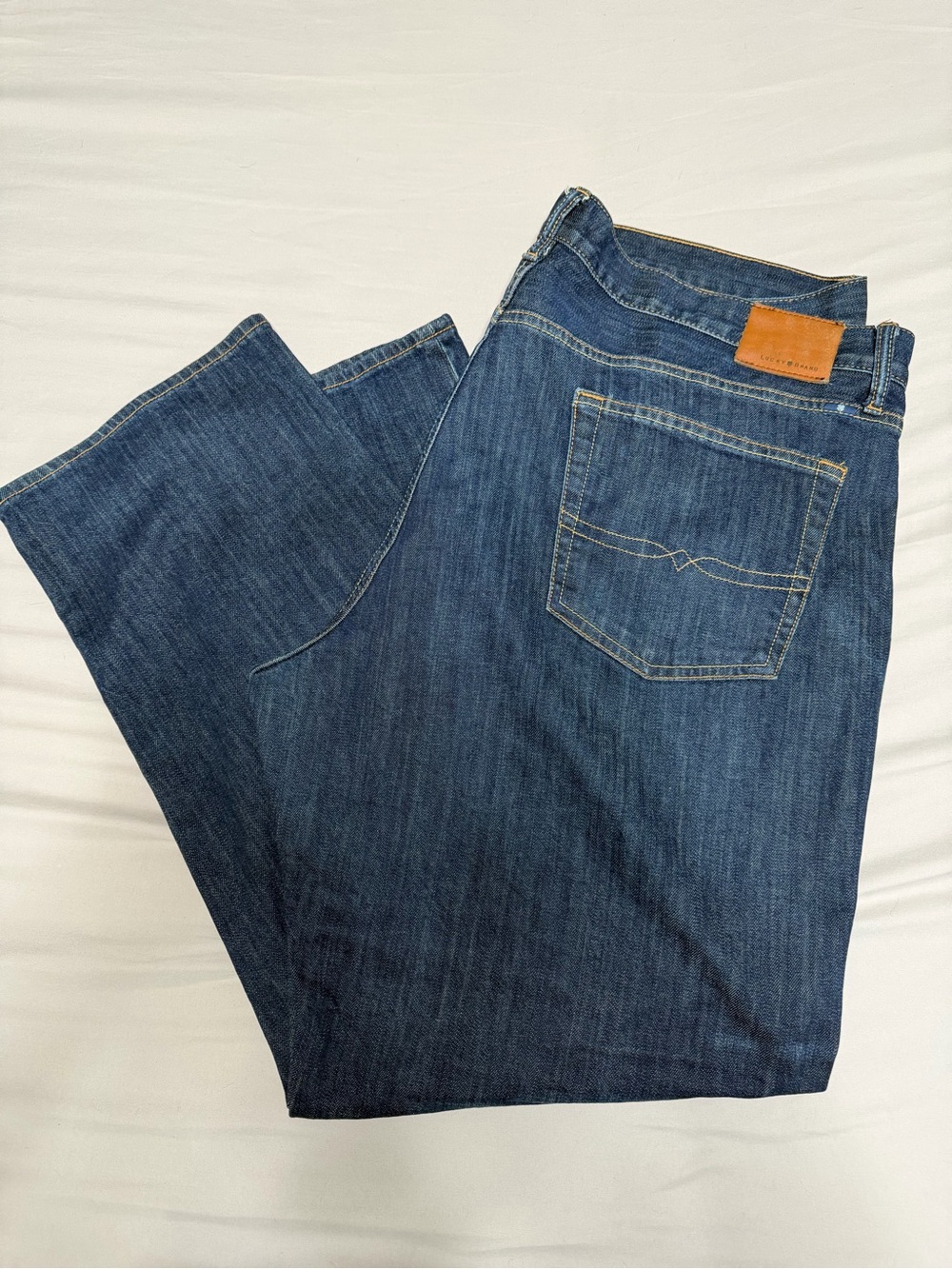 Lucky Brand Men's Bootcut Jeans in Blue Denim with Tan Patch